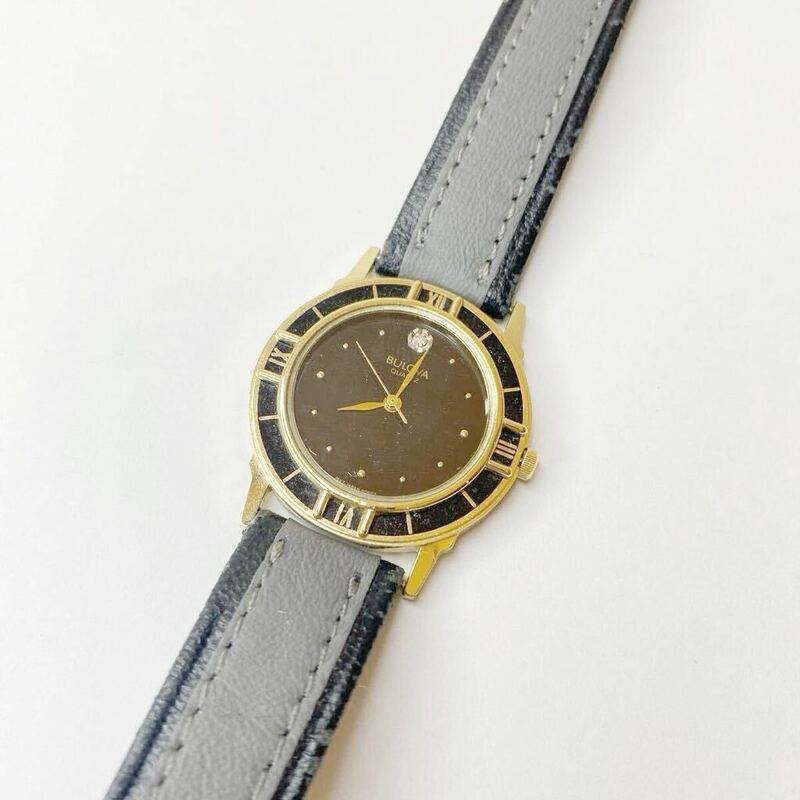 BULOVA ブローバ ブラック・ゴールドコンビモデル ダイヤ文字盤 レディース腕時計 クォーツ 稼働品