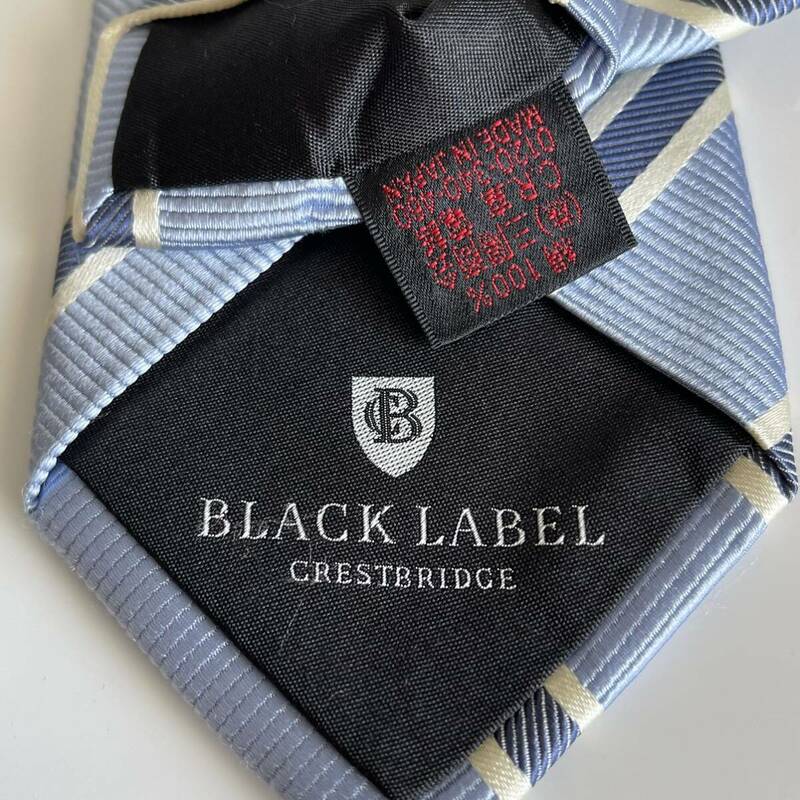 ブラックレーベルクレストブリッジ（BLACK LABEL CRESTBRIDGE） 水色紺ストライプワンポイントロゴネクタイ