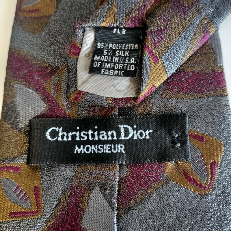 Christian Dior(クリスチャンディオール)グレー四角三角ワンポイントトロッター柄ネクタイ