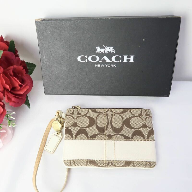 s749 コーチ フラットポーチ シグネチャー キャンバスレザーCOACH