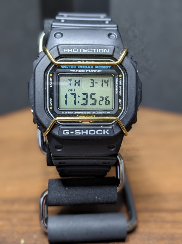 CASIO G-SHOCK カシオ ジーショックDW-5600E-1 おまけ：5600用ガードプロテクター（ゴールド）