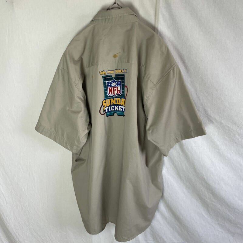 DIRECTV 半袖シャツ　古着　XLサイズ　ベージュ　NFL