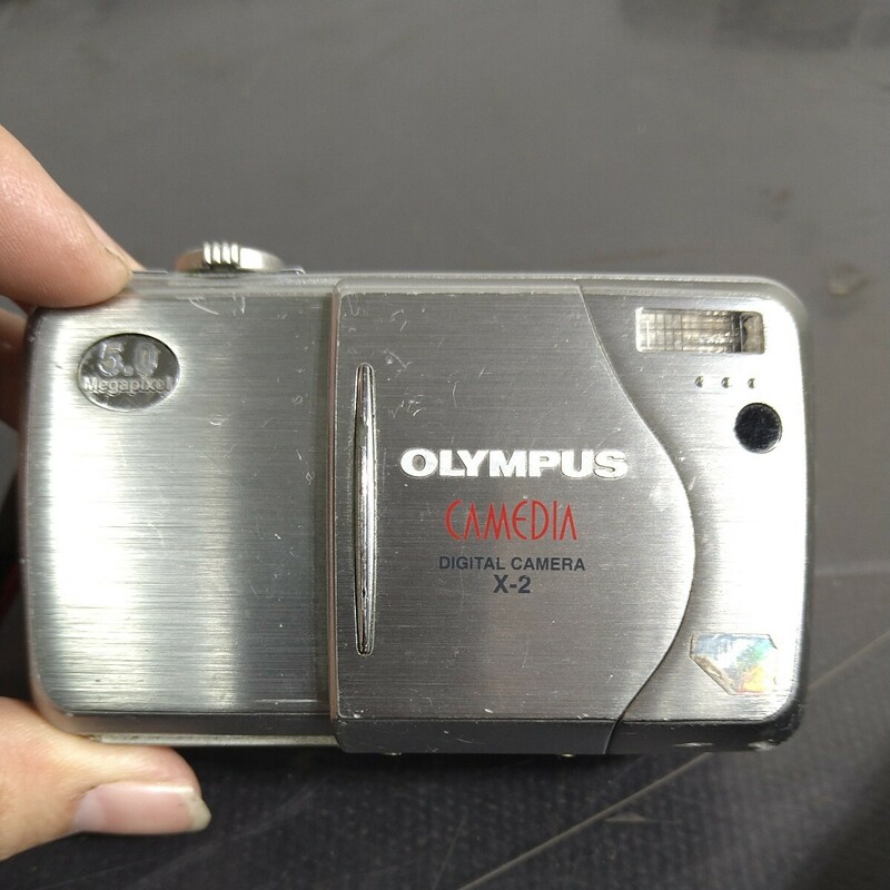 KS036.型番:X-2.0508.コンパクトデジタルカメラ. CAMEDIA. OLYMPUS.本体のみ.ジャンク