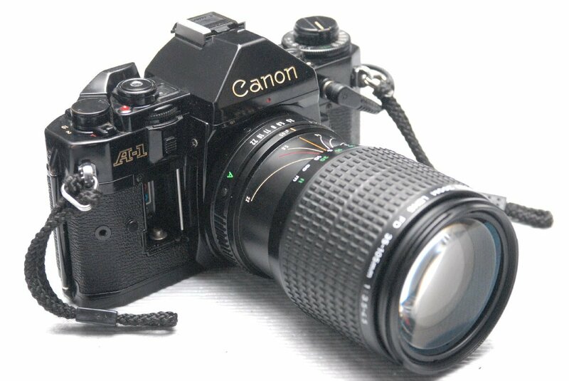 Canon キャノン 人気の高級一眼レフカメラ A-1 ボディ +（35-105mmレンズ付） 希少な作動品・（鳴き無し ）（腐食無し）