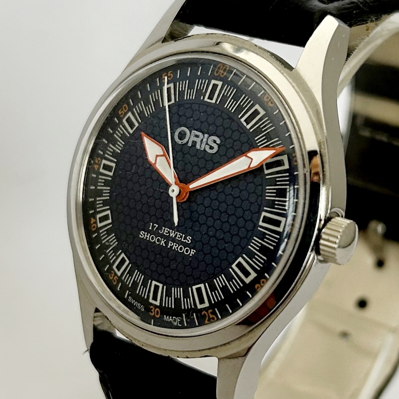 スイス老舗ブランドORIS　紳士用腕時計　ブルーダイアル　シルバーボディー　アンティーク　手巻機械式　35mm　黒革ベルト　17石　ST-96