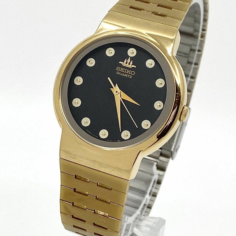 SEIKO 腕時計 ラウンド ドットインデックス 3針 クォーツ quartz ブラックフェイス ゴールド 黒 金 セイコー Y720
