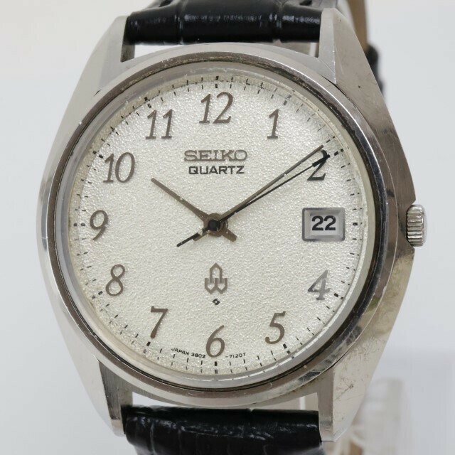 2404-644 セイコー クオーツ 腕時計 SEIKO 3802 7031 38クオーツ 日付 梨地文字盤 全数字 銀色ケース レザーベルト