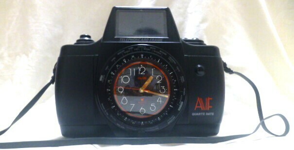 BIG CAMERA / 販促用カメラ型クォーツ時計 ◆ プラスチックケース / 世界時計仕様 ◆ 要電池交換