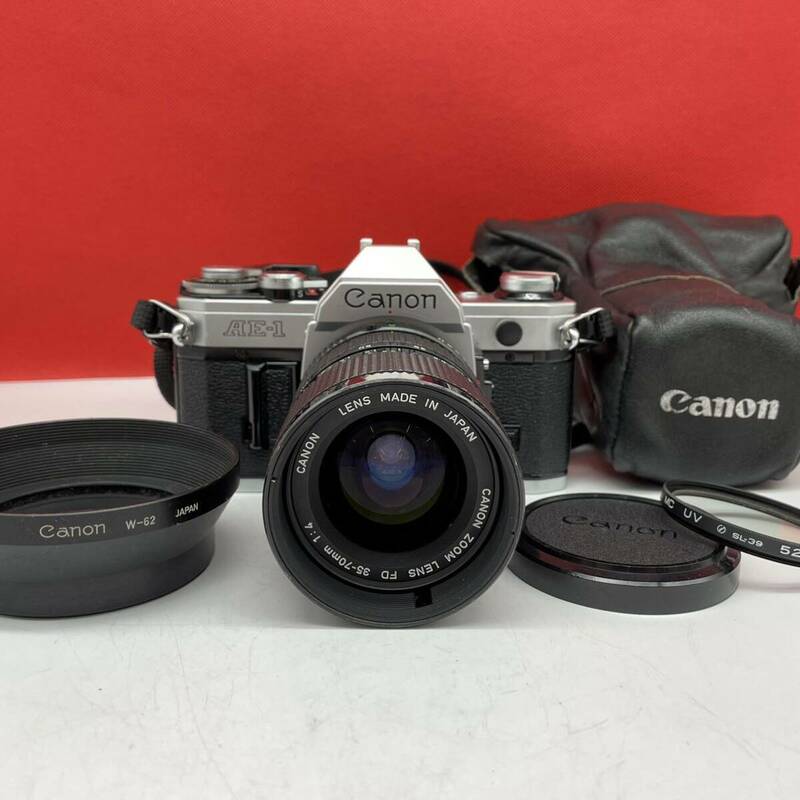 □ Canon AE-1 フィルムカメラ 一眼レフカメラ ボディ New FD 35-70mm F4レンズ ジャンク キャノン