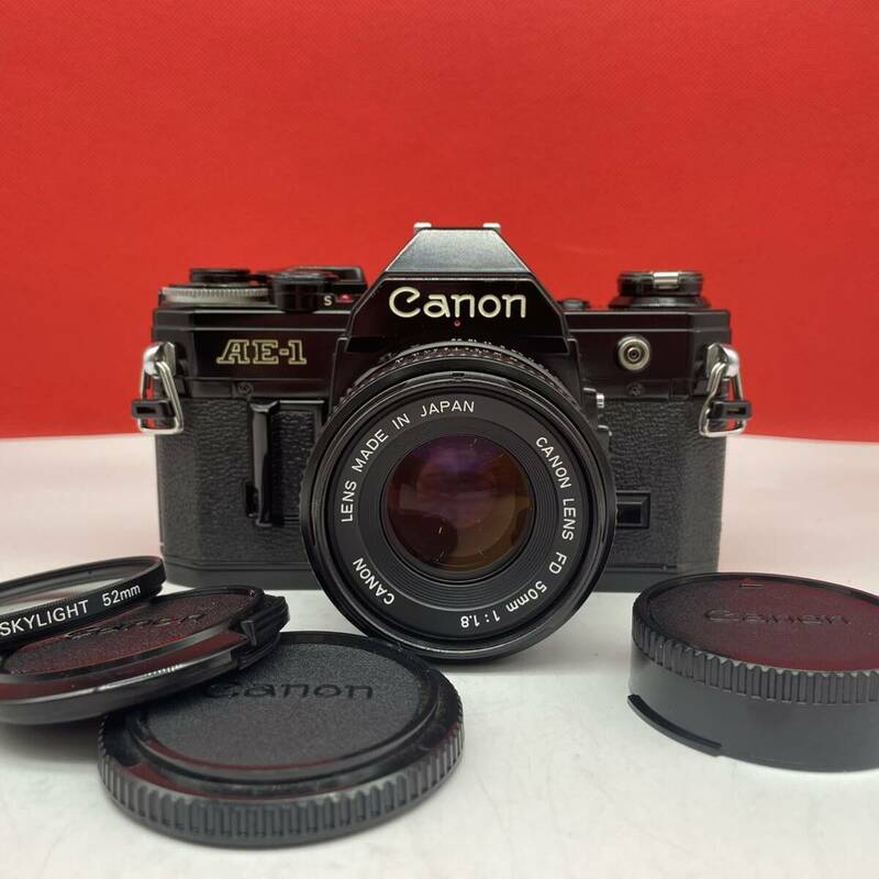 □ Canon AE-1 フィルムカメラ 一眼レフカメラ ボディ New FD 50mm F1.8 レンズ シャッター、露出計OK 現状品 キャノン