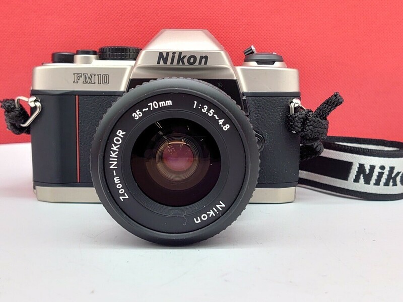 ▼ Nikon FM10 ボディ Zoom-NIKKOR 35-70㎜ F3.5-4.8 レンズ 一眼レフカメラ フィルムカメラ 動作確認済 シャッター、 露出計OK ニコン
