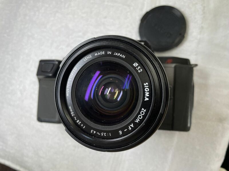 OM707/SIGMA ZOOM AF-ε 1:3.5~4.5 f=28~70mm