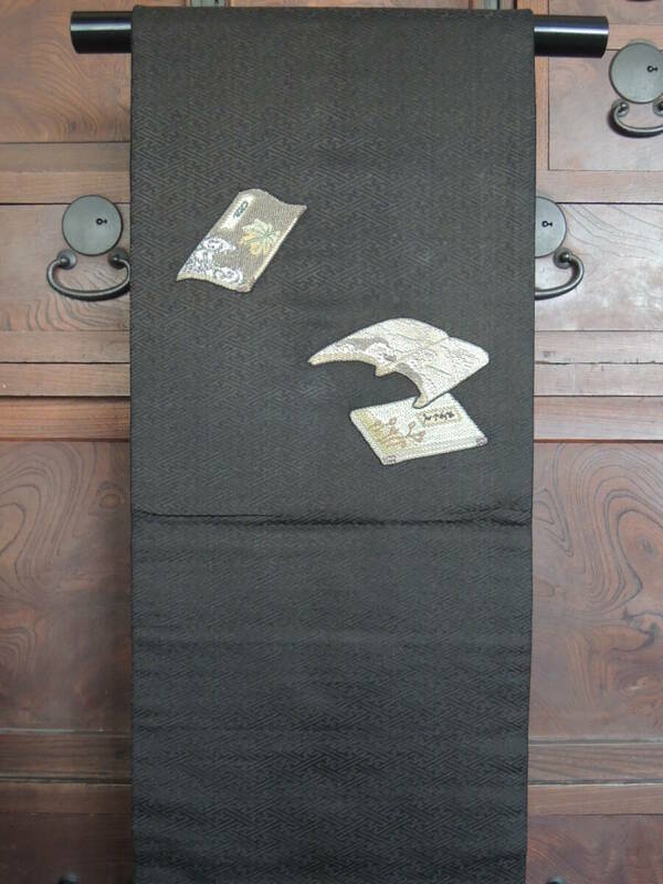 W2004■古布素材　開き名古屋帯　黒地に和本の織り柄■