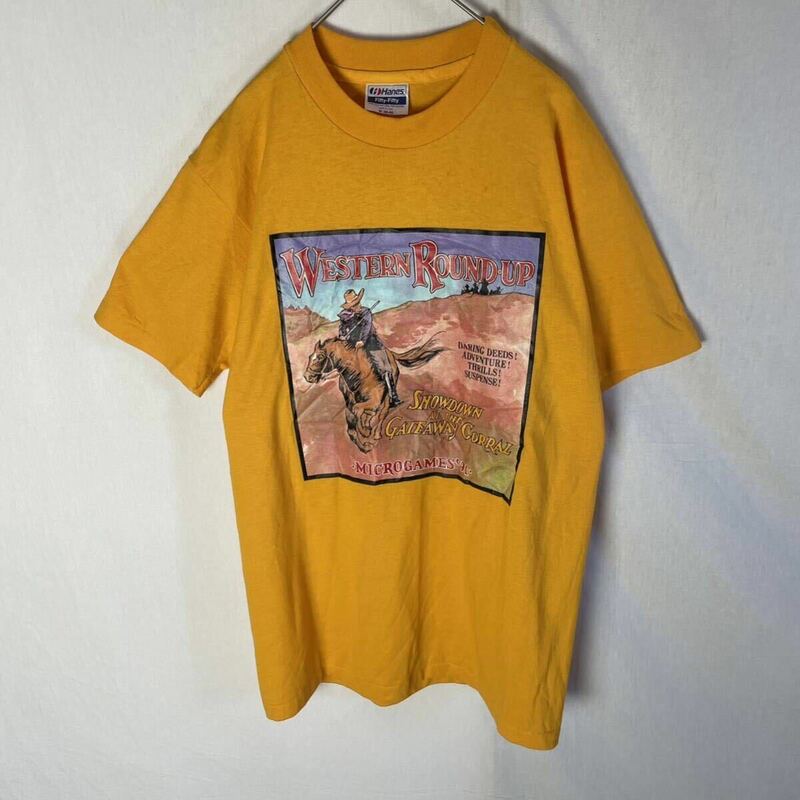 90's アメリカ製　ヘインズ　半袖プリントTシャツ　古着　Mサイズ　オレンジ　ヴィンテージ 