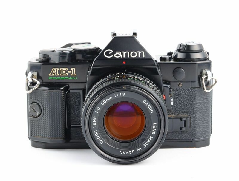 07216cmrk Canon AE-1P PROGRAM + New FD 50mm F1.8 MF一眼レフ フィルムカメラ 標準レンズ