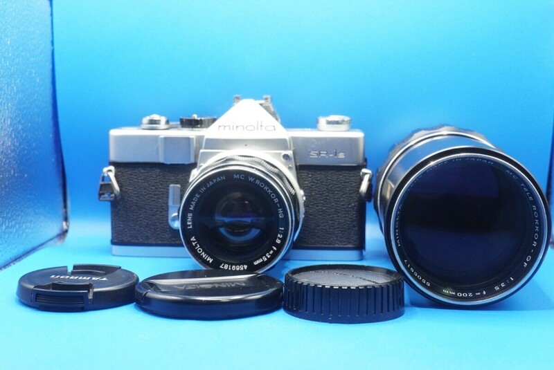 ミノルタ フィルム一眼レフカメラ(MINOLTA SR-1s),レンズ2本(35mm F2.8,200mm F3.5)キャップ類付属 カメラ動作不良,レンズ実写確認済品