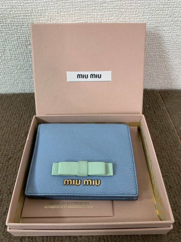 【中古品】miumiu ミュウミュウ コンパクトウォレット ミニ財布　ブルー　レザー　リボン　二つ折り　レディース