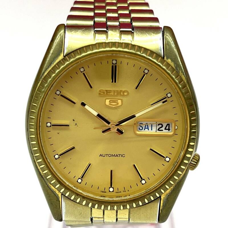 Z232-K18-4957◎ SEIKO 5 セイコー ファイブ メンズ腕時計 デイデイト AUTOMATIC 自動巻き 7S26-0500 裏スケルトン ゴールドカラー 稼働