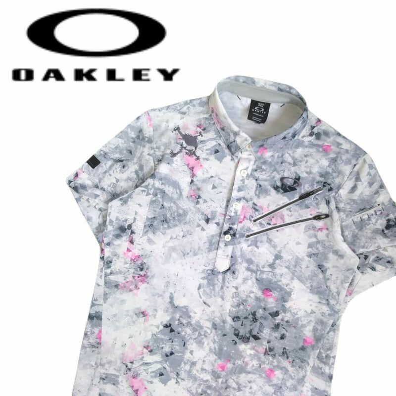着用少 極美 近年新作 最高級 OAKLEY 吸水速乾 ストレッチ 総柄 スカルロゴ 半袖ポロシャツ メンズM オークリー ゴルフウェア 刺繍 2405365