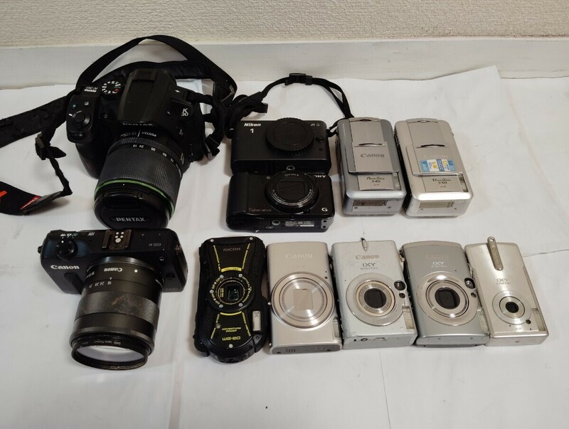 デジタルカメラ11台まとめPENTAX K-30 Nikon 1 J1Canon Power Shot S40 PC1016 Power Shot S50 PC1048Canon EOS M DS126391SONY 