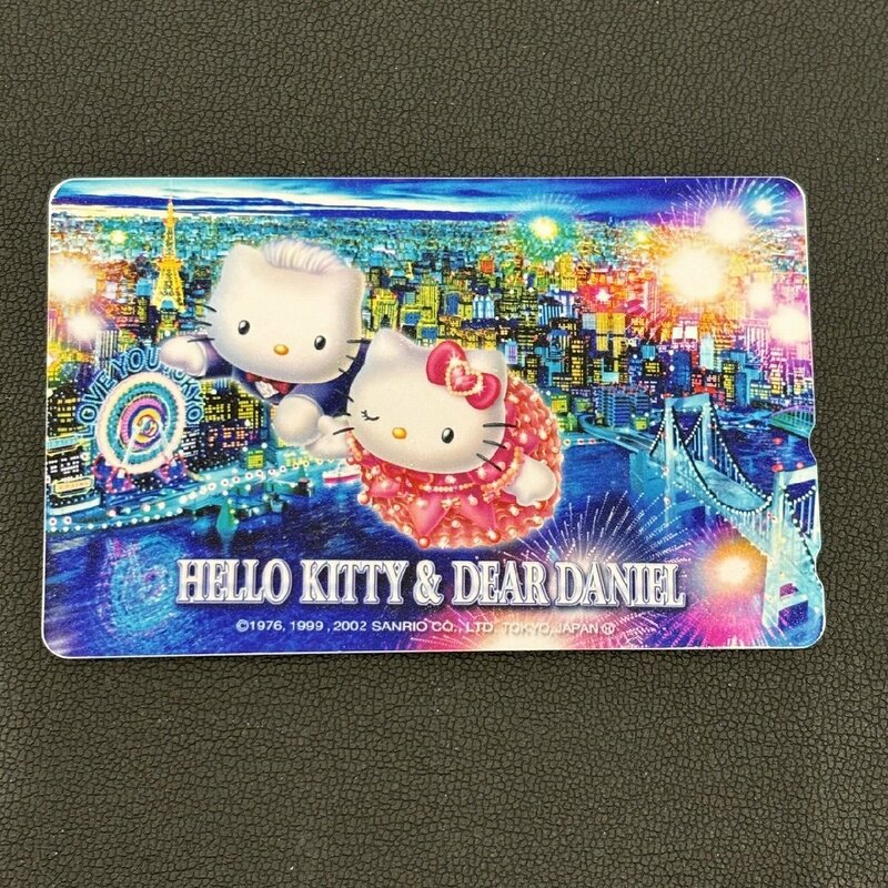 Ω希少品！レア品！【テレホンカード テレカ 50度数 未使用 HELLO KITTY & DEAR DANIEL キティちゃん ダニエルくん サンリオ】NA01642