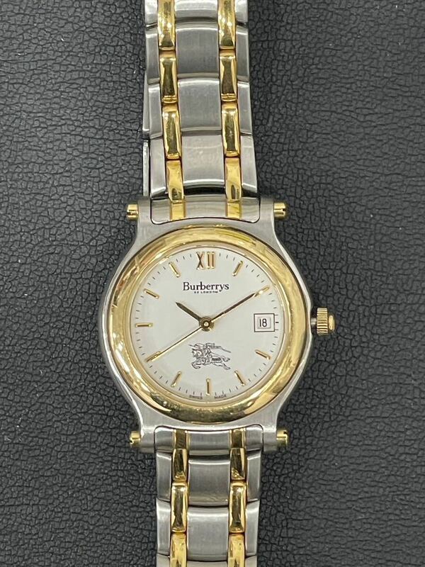 4-003 Burberrys バーバリーズ レディース 腕時計 8100 クオーツ デイト 白文字盤 シルバー×ゴールド　不動　現状品