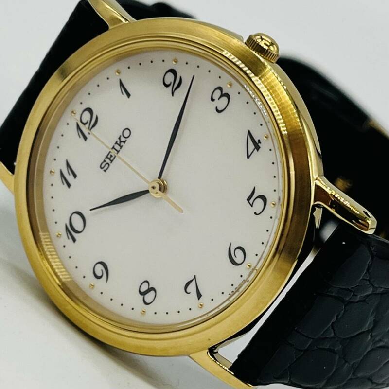 SEIKO セイコー 7N01 5BAR 腕時計 白文字盤 ゴールドカラー 革ベルト 美品 ST.STEEL 3針 QZ クオーツ シンプル おしゃれ 日本製 中古 3681