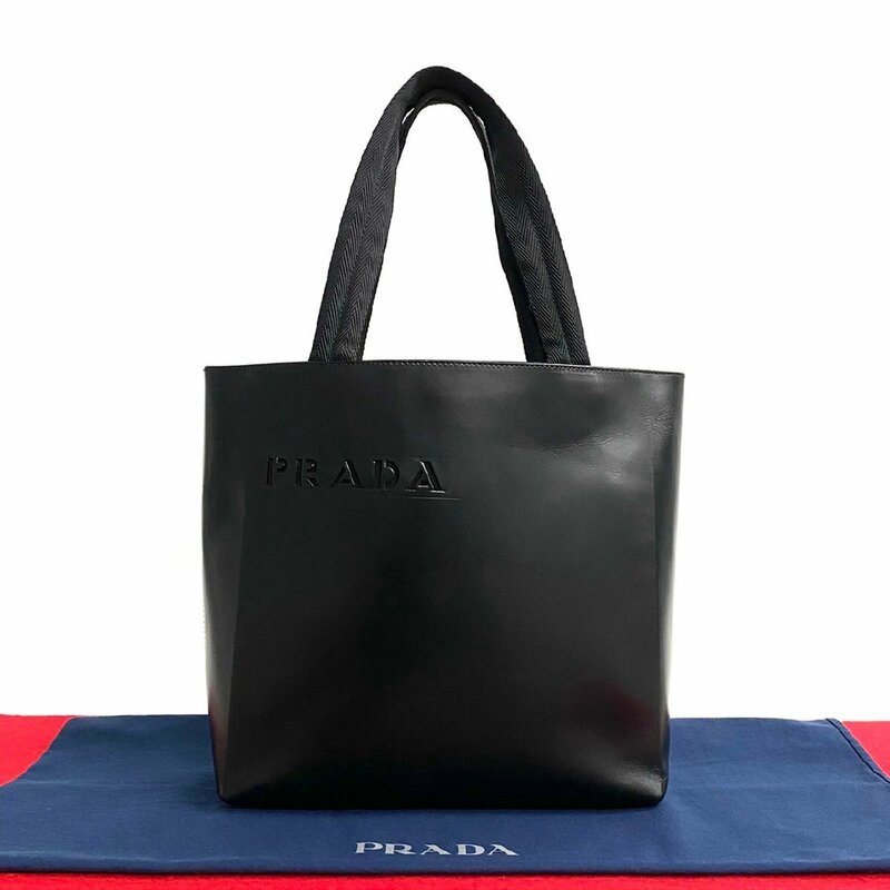 ほぼ未使用 レア品 PRADA プラダ パンチング ロゴ レザー 本革 ナイロン ハンドバッグ ミニ トートバッグ ブラック 黒 66603