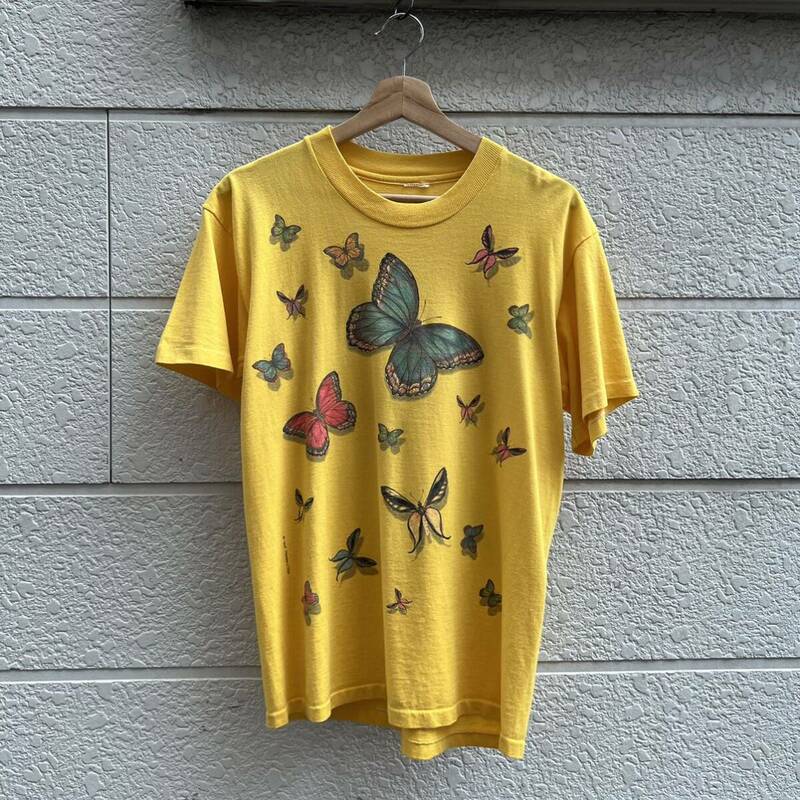 90s USA古着 黄色 プリントTシャツ 半袖Tシャツ 蝶々 バタフライ Human-i-Tees 総柄 アメリカ古着 vintage ヴィンテージ イエロー