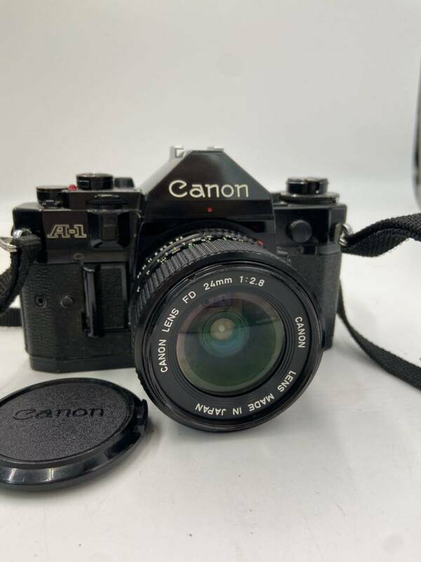 #64e9a Canon キャノン A-1 24mm 1:2.8 一眼レフ フィルムカメラ 動作未確認