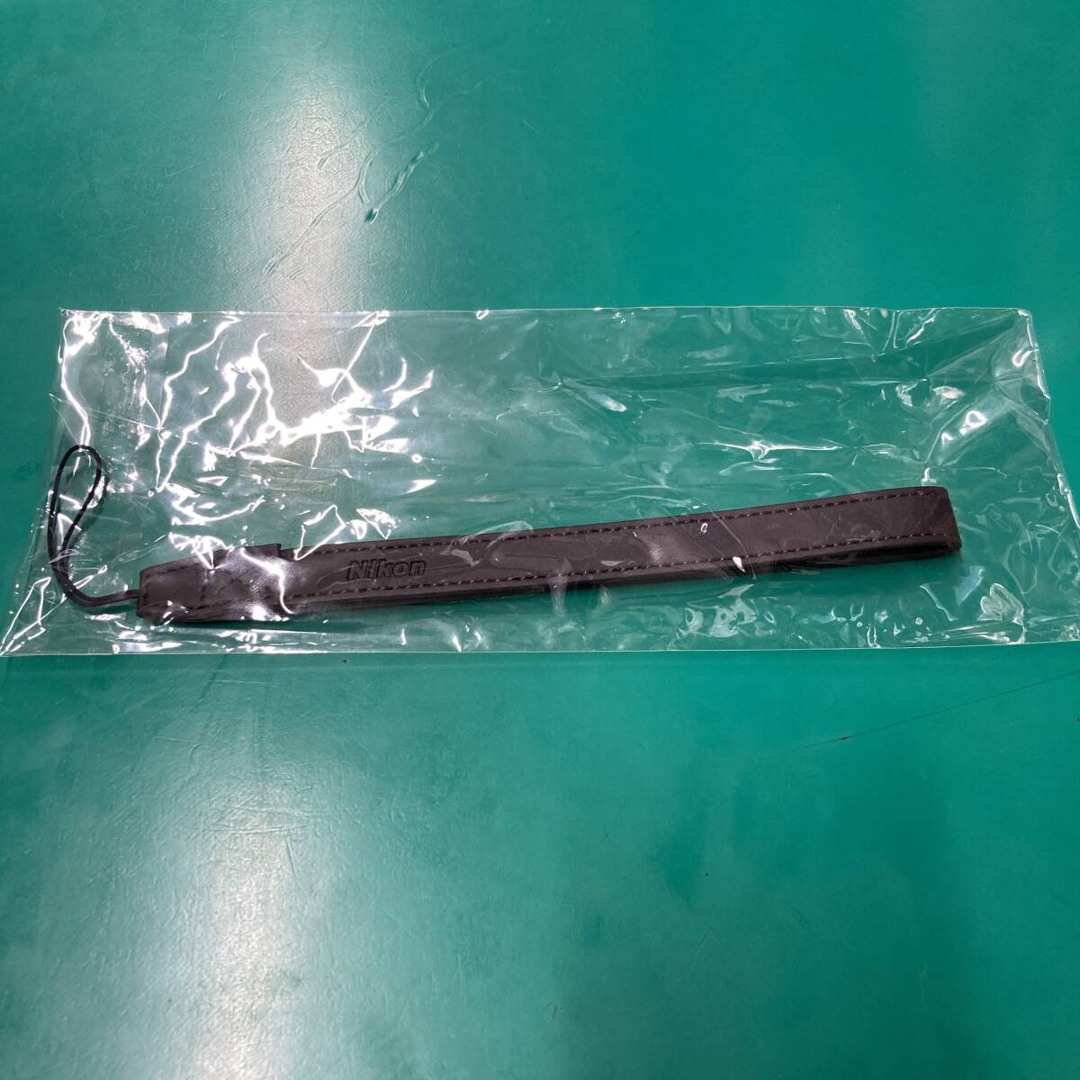★ ニコン Nikon ロゴ入り ハンドストラップ ブラウン 非売品 未使用 新品