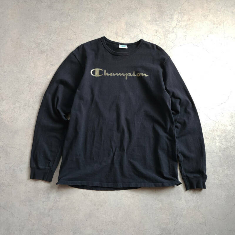 YH266/XLサイズ/Champion チャンピオン 長袖Tシャツ ゴールドプリント 黒(ブラック)系 USED 古着 ヘビーウェイト スポーツブランド ロゴ