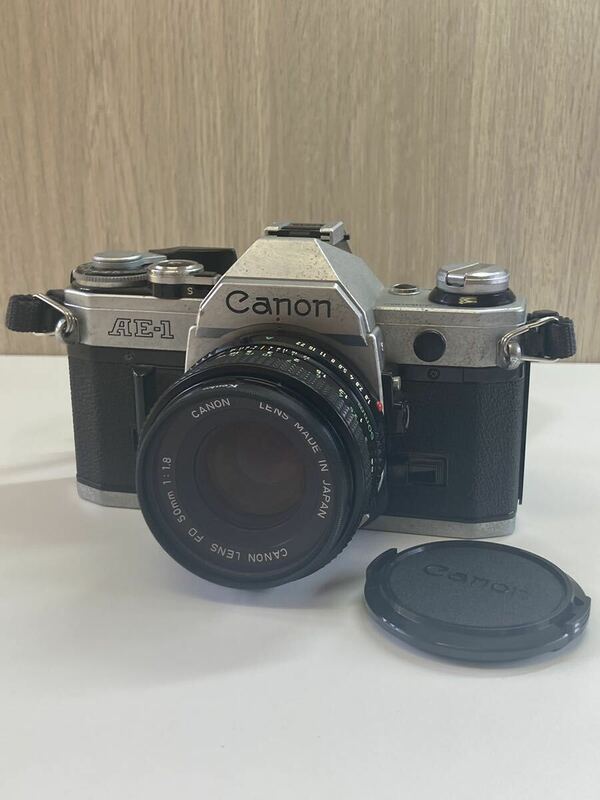 キヤノン Canon AE-1 + NEW FD 50mm F1.8 フィルム マニュアルフォーカス 一眼レフカメラ 【中古】
