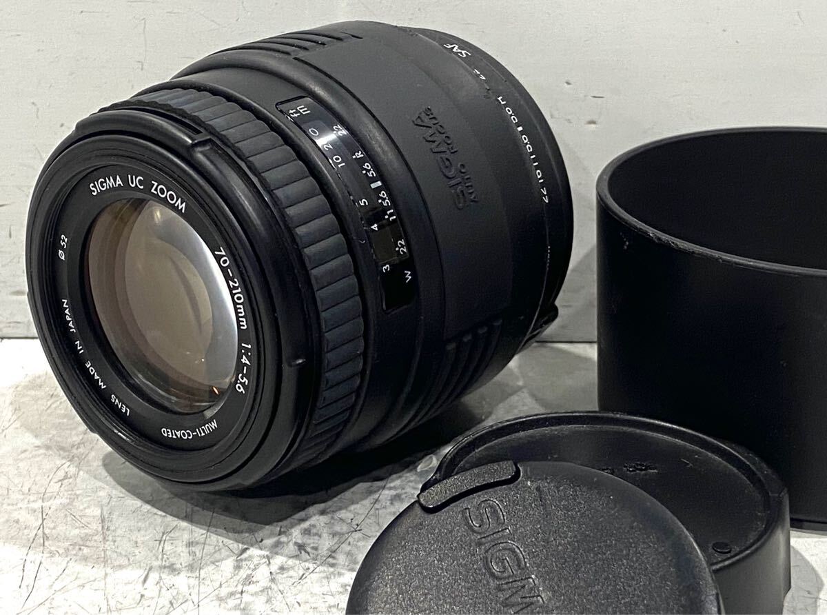 241201A☆ SIGMA UC ZOOM 70-210mm 1:4-5.6 MULTI-COATED LENS MADE IN JAPAN φ52 Canon用AFレンズ フード付 ♪配送＝宅急便(EAZY)♪